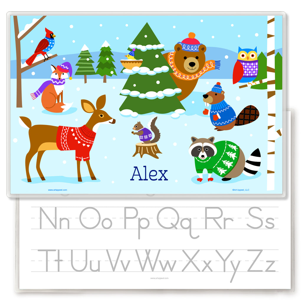 Image showing front and back of a Personalized place mat for kids with woodland animals in a winter scene. Animals are wearing sweaters and knit hats.  Child&#39;s name is at the bottom center.  Reverse has alphabet letters for tracing.