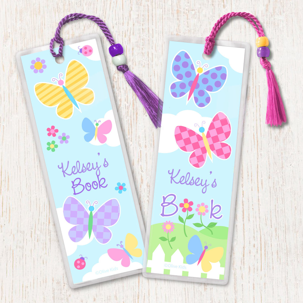 Personalized kids booksmarks with pink, blue, yellow butterflies on pastel background, includes tassell and beads.