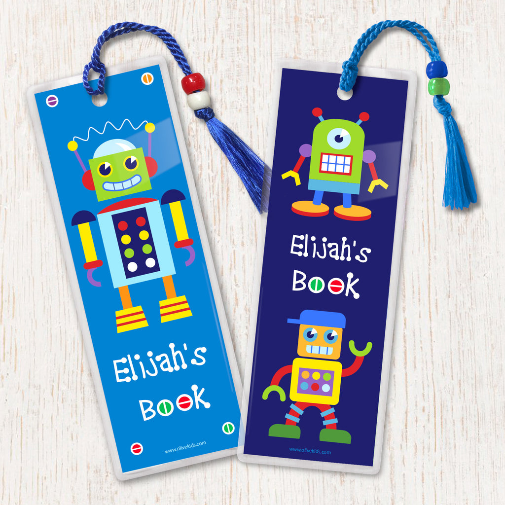 Kids personalized bookmarks with colorful robots on blue background, decorated with tassel and beads.