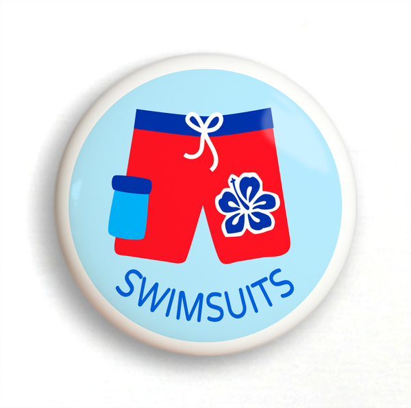 Ceramic drawer knob with boys Ceramic drawer knob on a dresser, with red boys bathing suit on a light blue background with the word swimsuits written belowbathing suit on a light blue background with the word swimsuits written below
