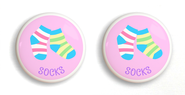 2 Ceramic drawer knobs, striped socks on a pink ground with the word socks written below