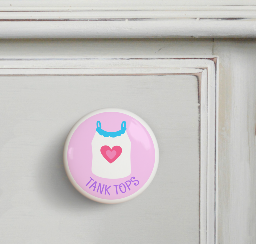 Ceramic drawer knob on a dresser, girl's tank top on a pink background with the word Tank Tops written below