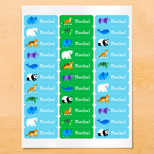 Personalized kids lables with pandas, whales, polar bears and other animals on blue and green backgrounds