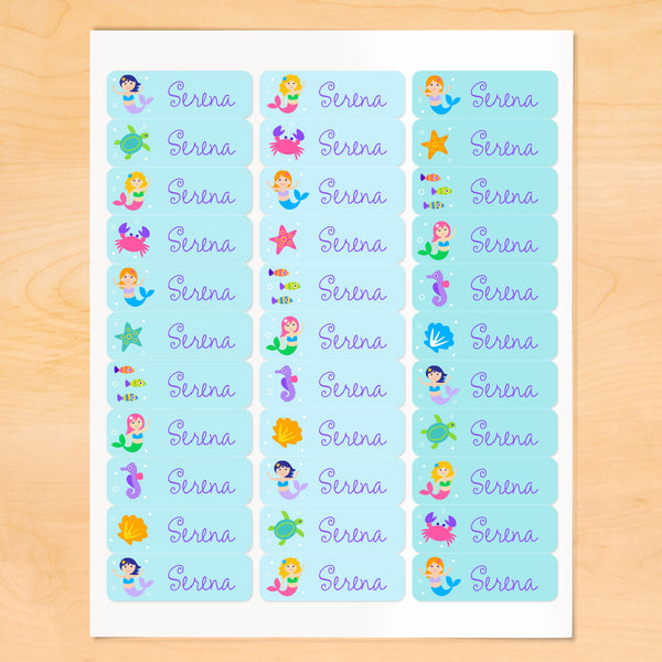 Personalized kids lables with mermaids, starfish and sea creatures on soft blue backgrounds