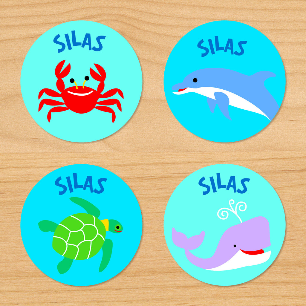 Ocean personalized kids round waterproof labels with name, sea turtle, whale, dolphin and crab on blue ocean water sealife tropical background