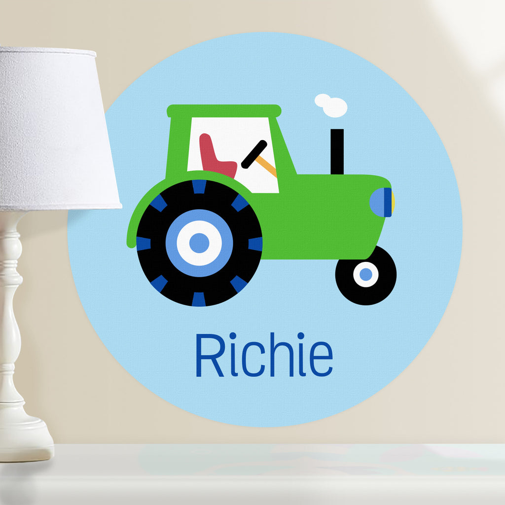 Personalized kids tractor wall decal.  Green tractor on a light blue background. Circular shape decal.