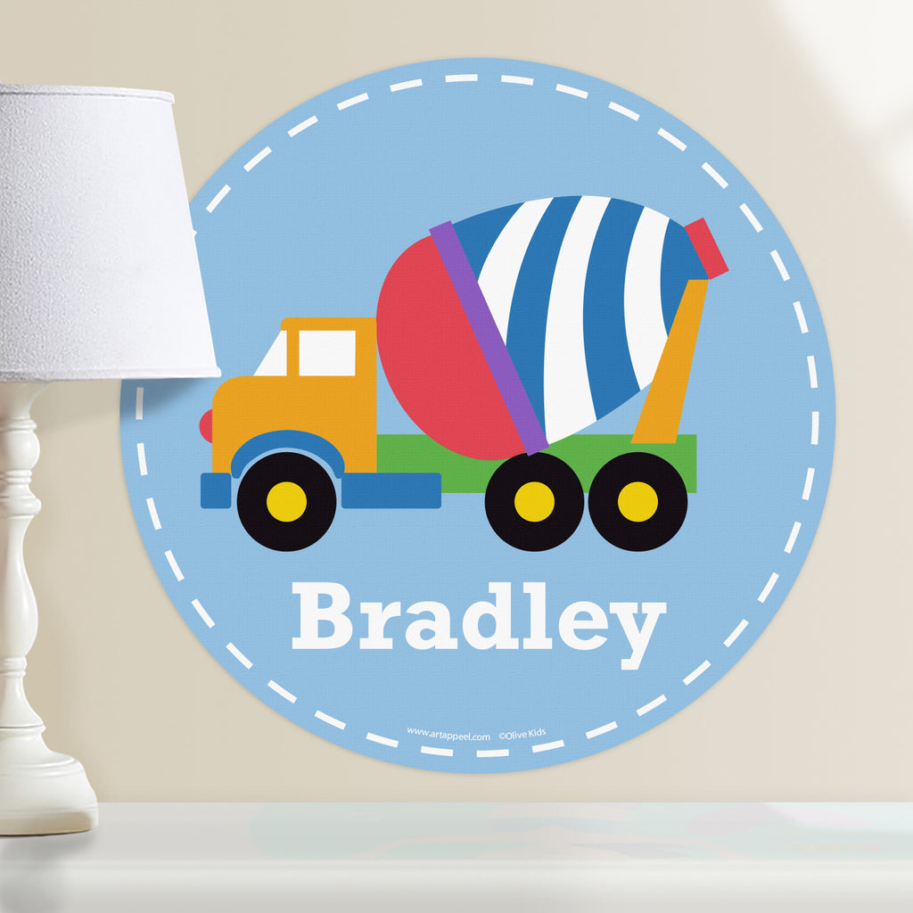 Kids personalized construction themed circular wall decal. Colorful cement mixer on blue background.