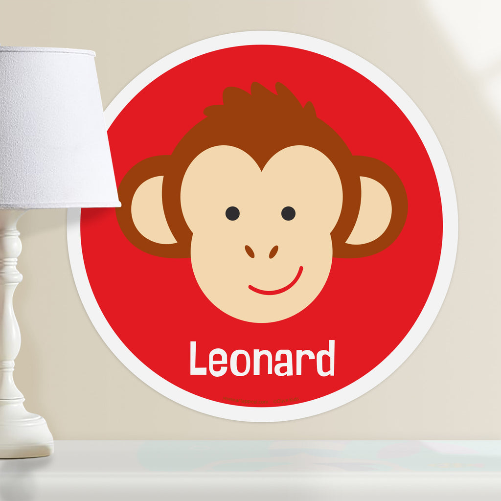 Kids personalized circular wall decal. Happy baby monkey portrait on a red background.