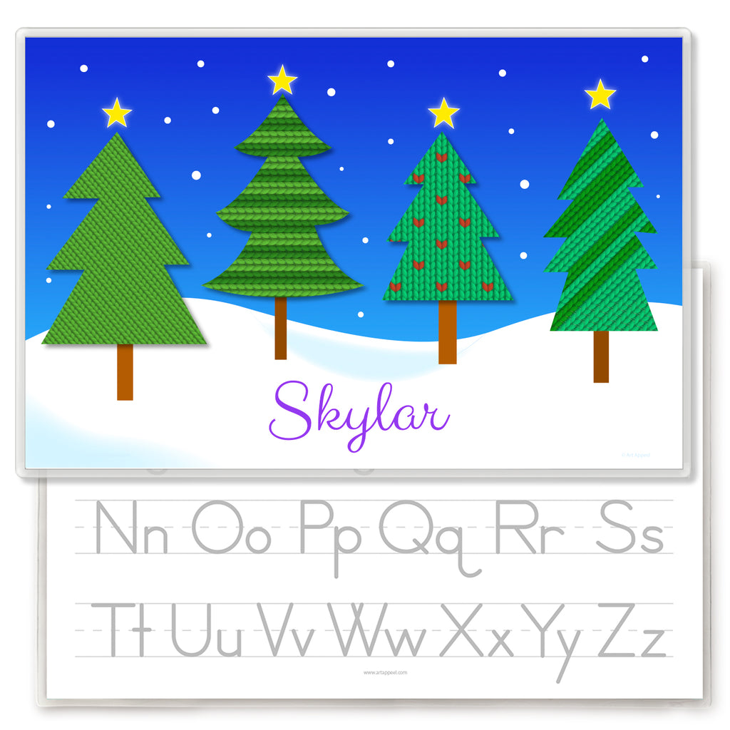 Christmas Pine Trees personalized placemat for kids. Four pine trees with sweater knit patterns on a snowy scene. Personalized with name at the bottom. Reverse side has alphabet letters for tracing.