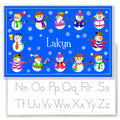Personalized Snowman placemat for kids. Front is deep blue with 12 snowmen each with colorful hats or scarves. Name is in the center in white with snowflakes. Back has alphabet letters for tracing.