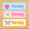Butterfly garden kids personalized name waterproof labels with butterfly, flower, and ladybug in pastel colors
