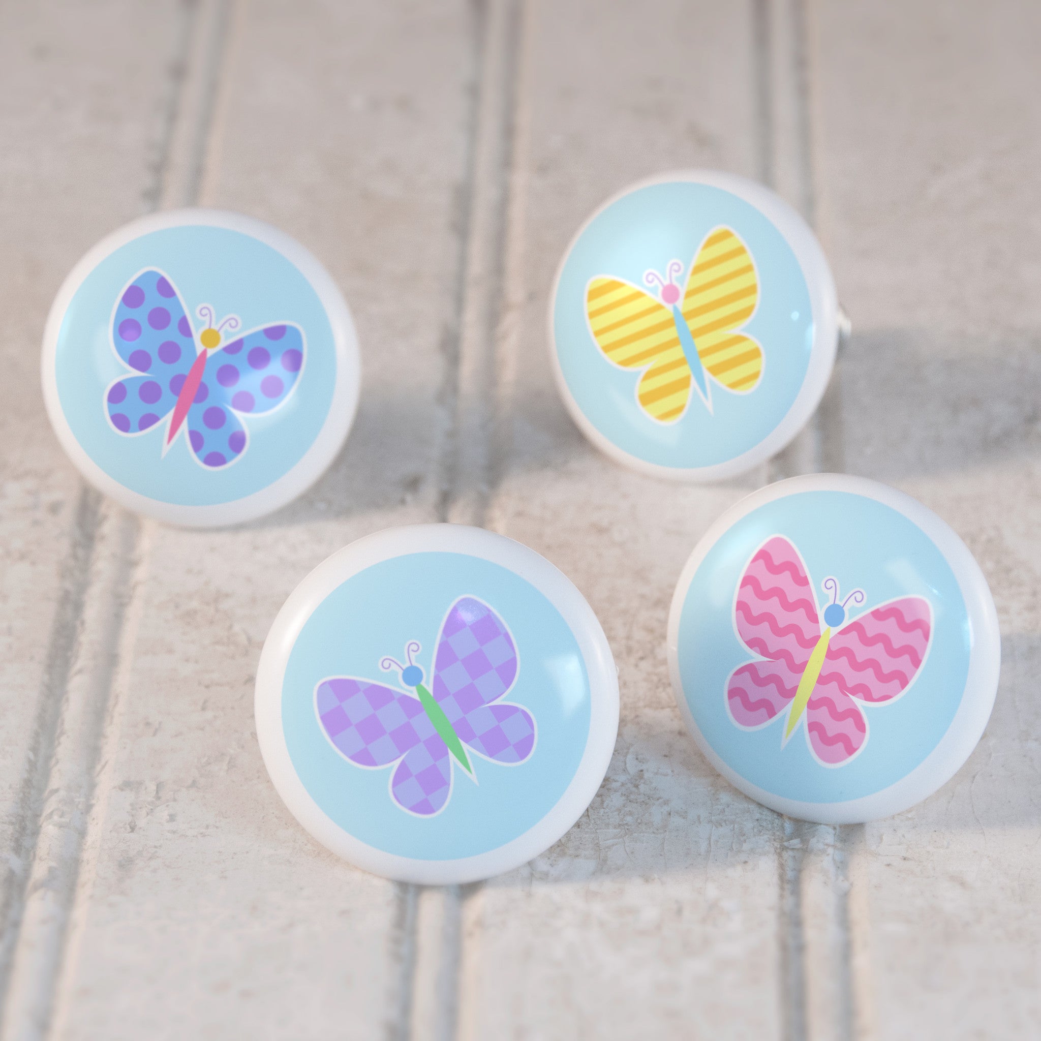 Butterfly Garden Set of 4 Small Ceramic Kids Drawer Knobs by Olive Kids from Art Appeel