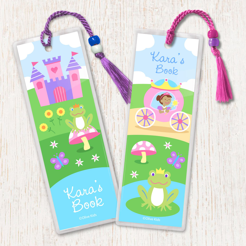 Kids personalized princess bookmarks with dark skin princess in coach, and with castle in landscape. Decorated with tassel and beads.