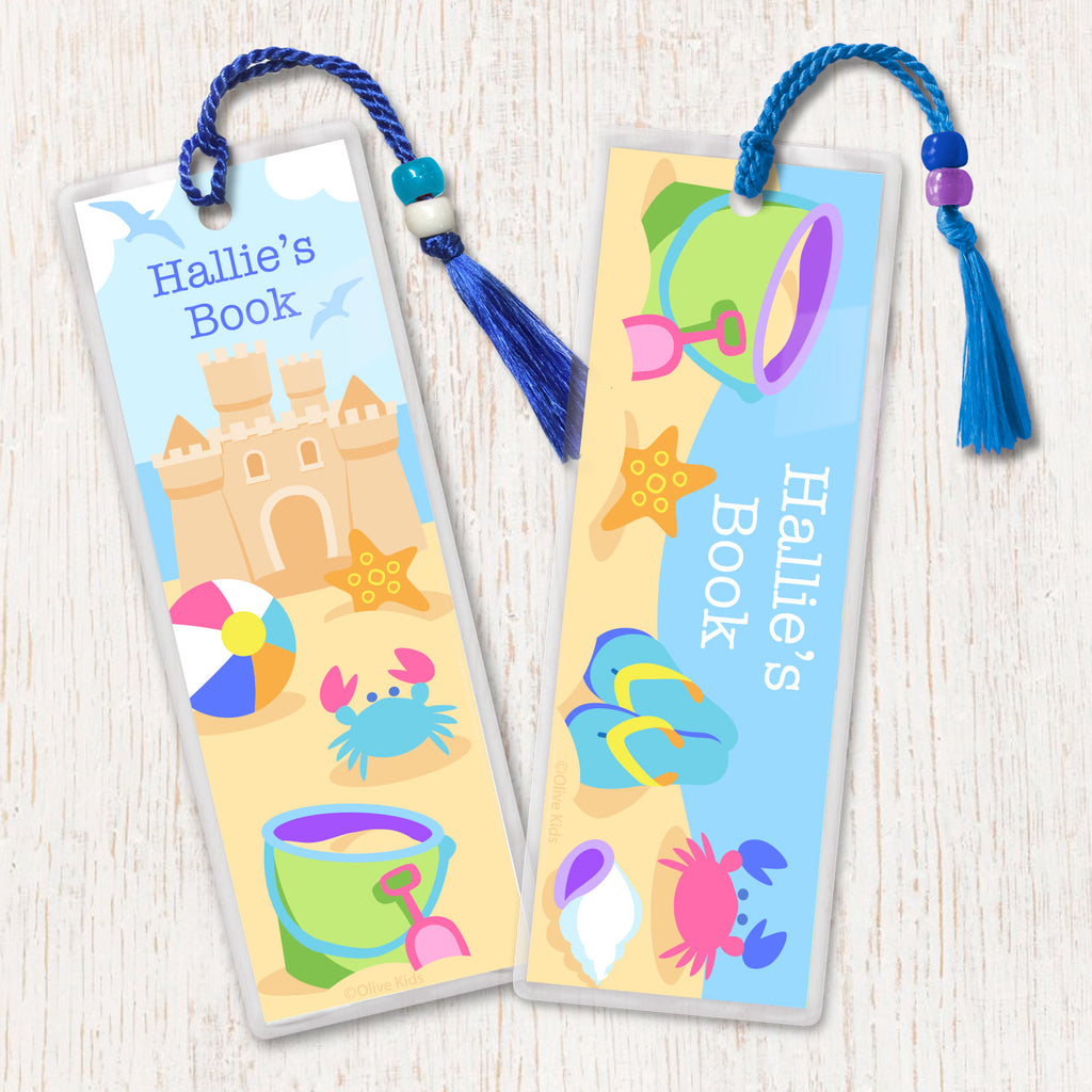 Kids personalized beach themed bookmarks with sandcastle, pail and shovel, flip flops and shells, decorated with tassell and beads.