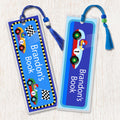 Kids personalized bookmarks with vintage racecars and checker flag. Bright colors on blue background and decorated with beads and tassel.