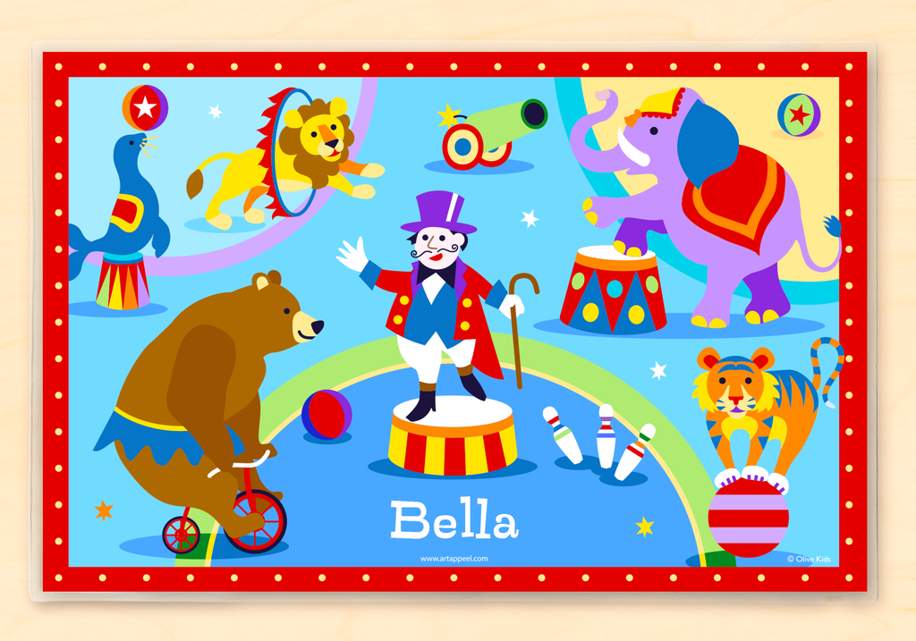 Big Top Circus Personalized Kids Placemat features a ring master, elephant and old time circus animals.  Blue and red background.