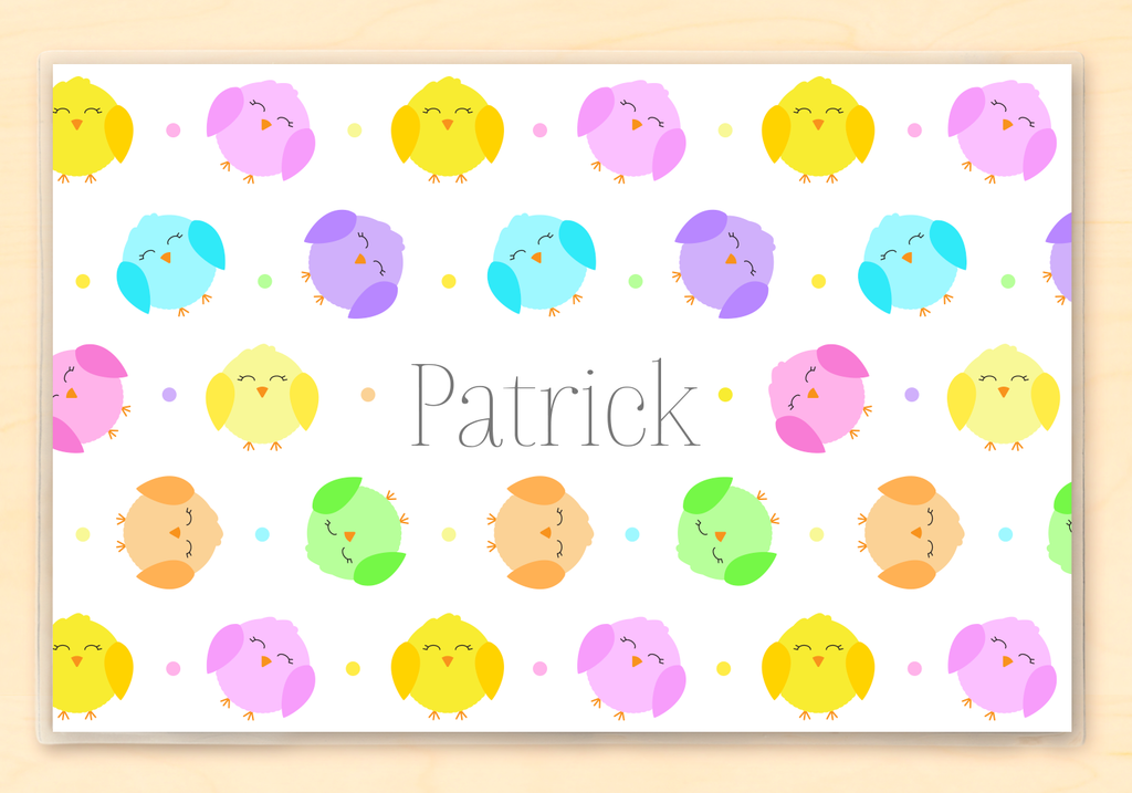 Cute little chicks on a personalized Easter placemat.