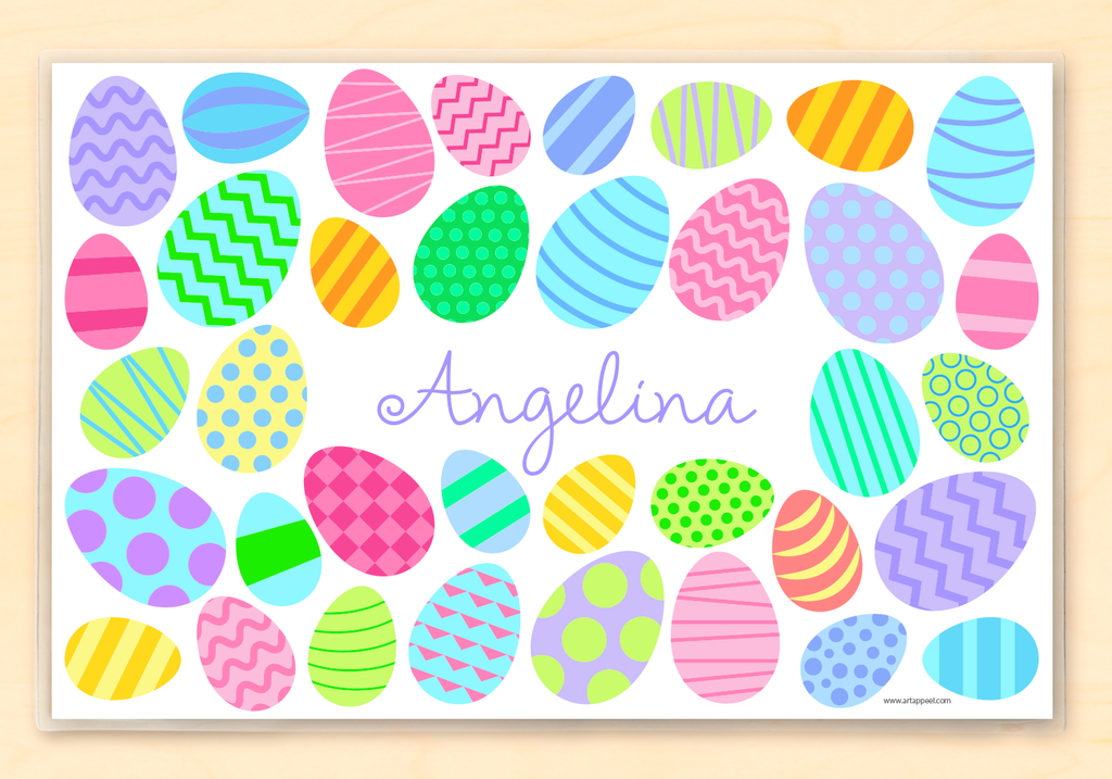 Colorful decorated Easter eggs on a white background.  Child's name is featured in the center.