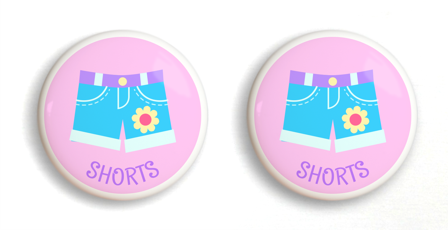 2 Ceramic drawer knobs, girls shorts on a pink ground with the word shorts written below