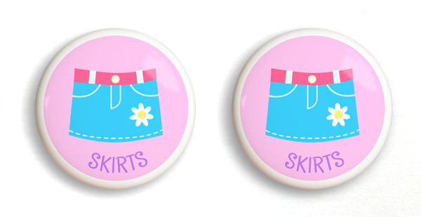 2 Ceramic drawer knobs, Girls skirt on a pink ground with the word Skirts written below