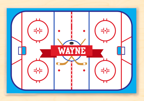Hockey Rink personalized children's sports placemat with a top-down view of a hockey rink and child's name in white varsity letters on a red ribbon