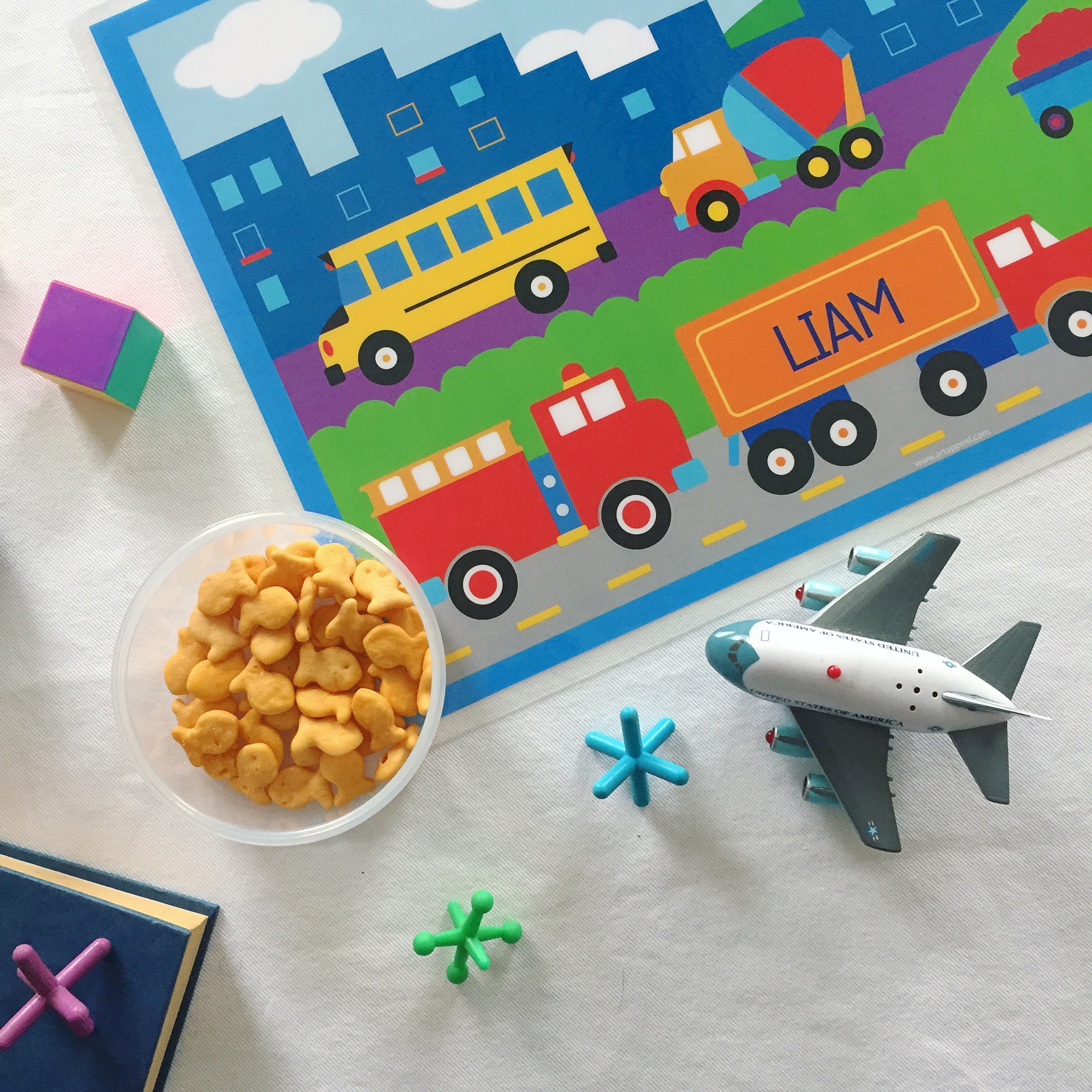 Personalized kids boys transportation placemat with trucks, airplane, bus, firetruck, and tractor