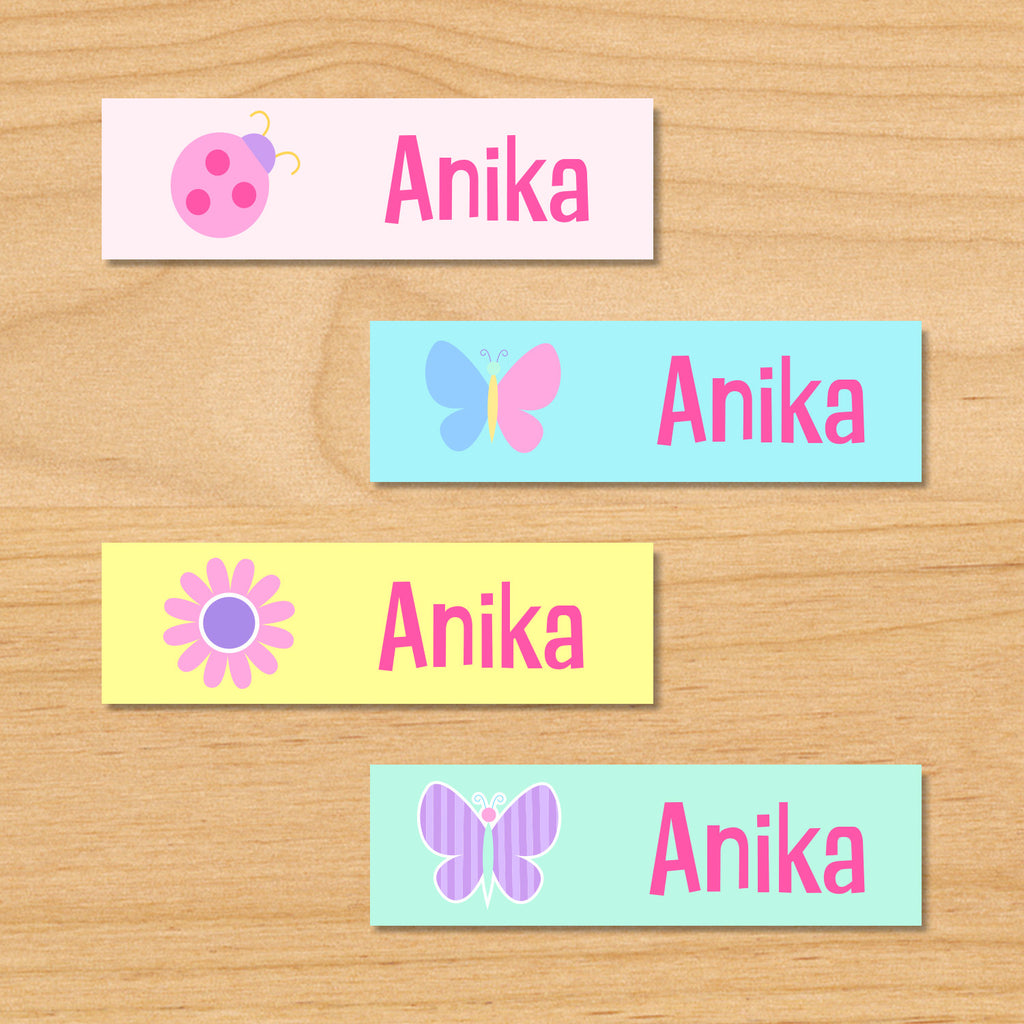 Butterfly garden kids spring personalized name waterproof labels with butterfly, flower, and ladybug in pastel colors on pink, blue and yellow backgrounds