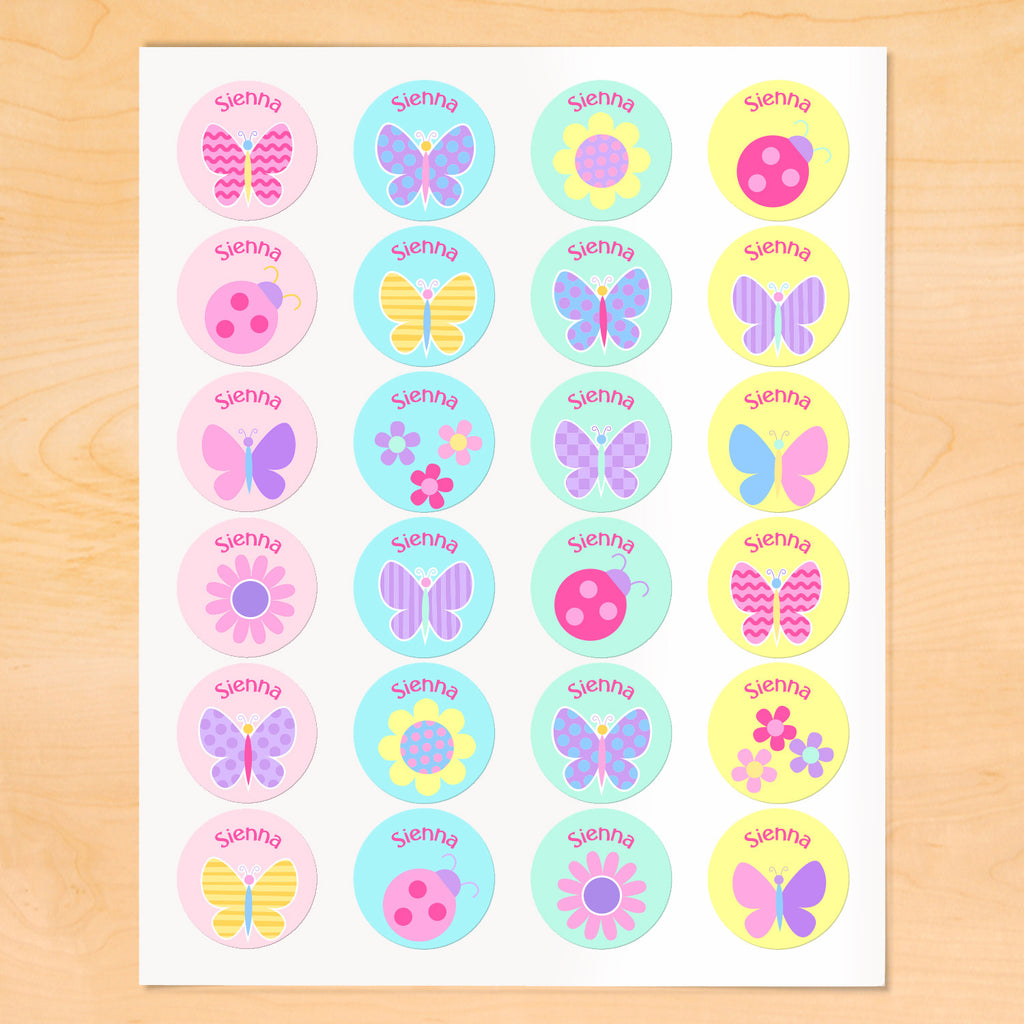 Personalized kids round lables with butterflies, flowers and ladybugs on soft color backgrounds