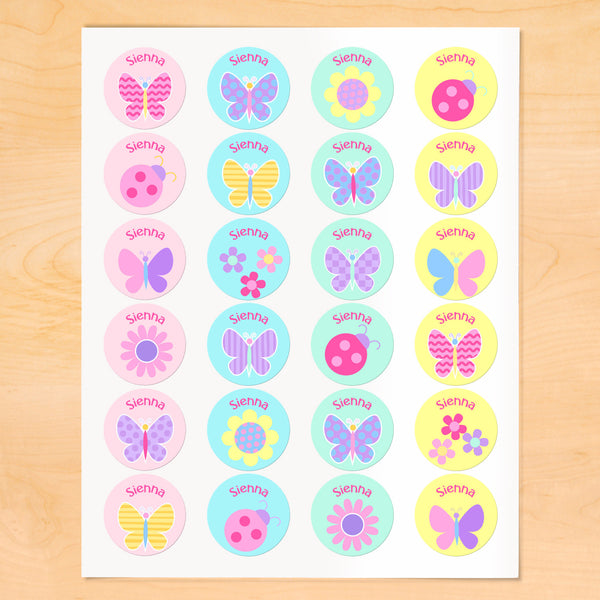 Personalized kids round lables with butterflies, flowers and ladybugs on soft color backgrounds