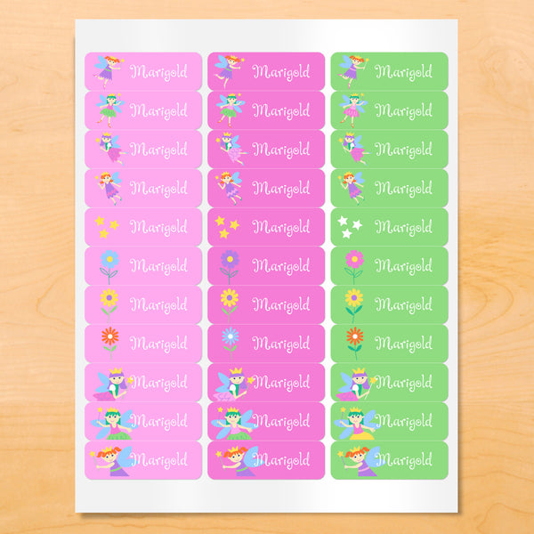 Personalized kids lables with fairies and flowers on softly colored pink, green and purple backgrounds
