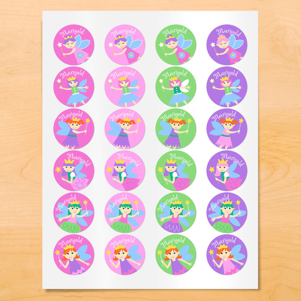 Personalized kids round lables with fairies and flowers on softly colored pink, green and purple backgrounds