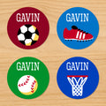 Game on sports kids round boys waterproof labels with soccer ball, soccer cleat, baseball, and basketball net on red, green and blue varsity backgrounds