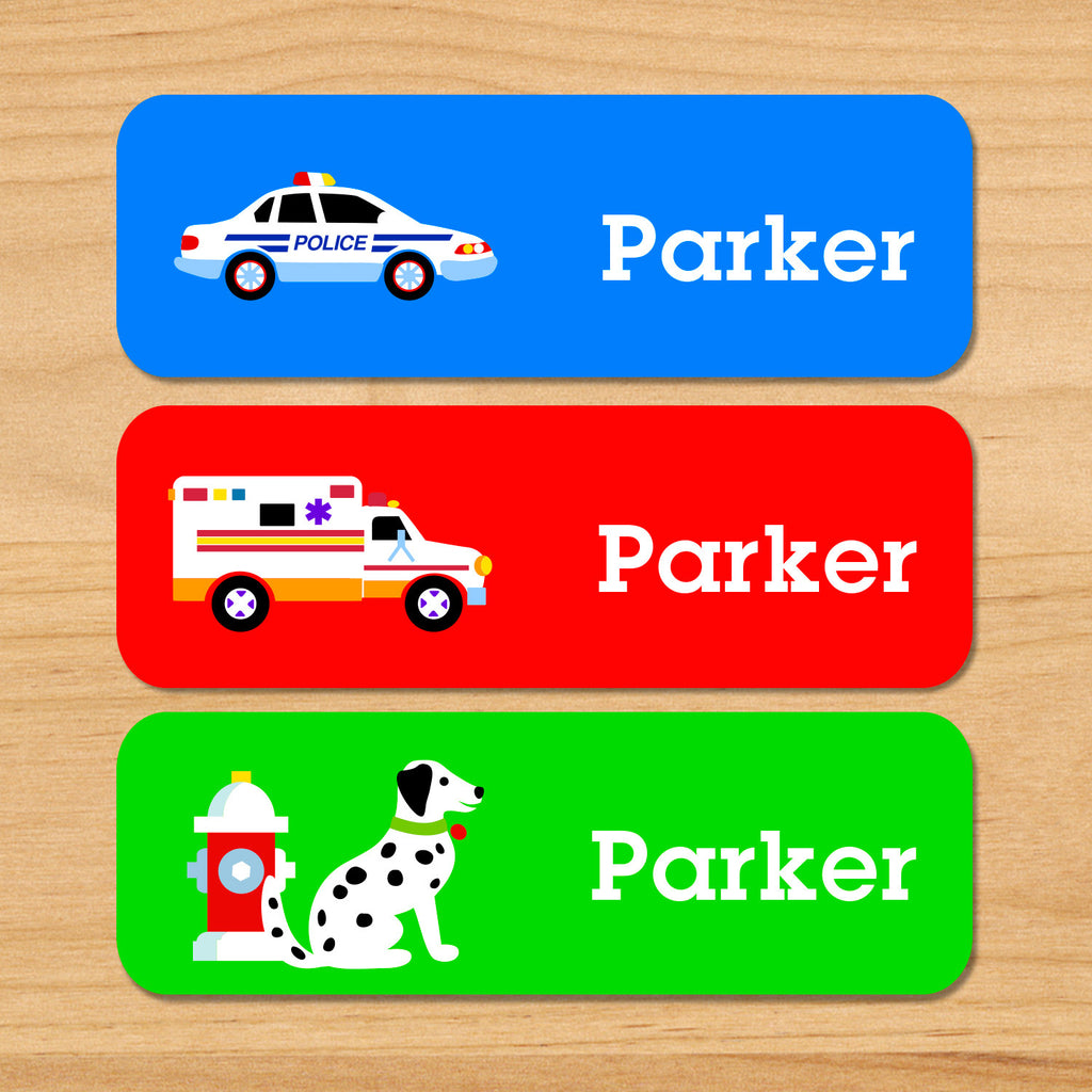Heros personalized kids waterproof labels with name, police car, ambulance, fire hydrant, and dalmatian on blue, red, and green backgrounds