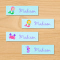 Mermaids personalized kids mini waterproof name labels with crab, seahorse, mermaids, and bubbles on a blue and turquoise underwater ocean background