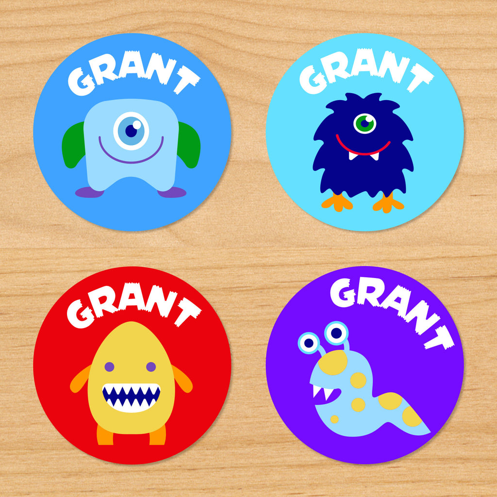Monsters personalized kids round name labels with colorful monsters on red, blue and purple backgrounds