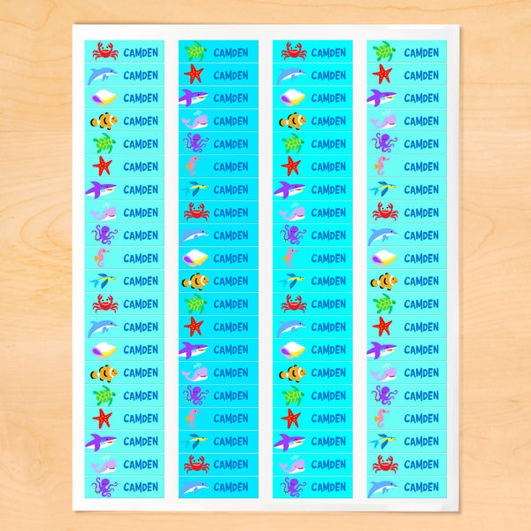 Personalized kids mini lables with colorful sea creatures on blue-green backgrounds