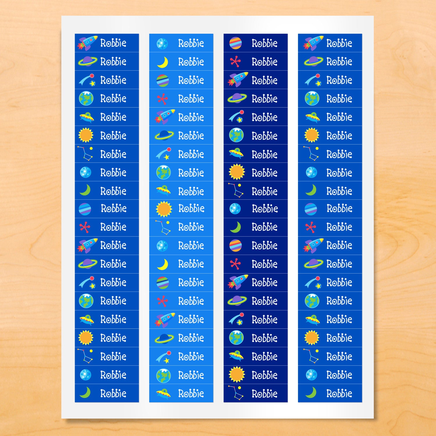 Personalized kids mini lables with planets, rocket ships, and stars on blue backgrounds