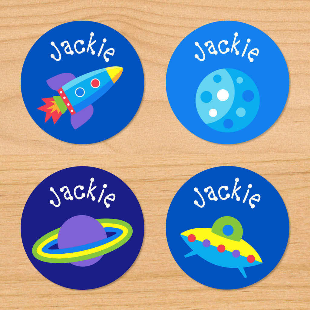 Out of this world space kids personalized round waterproof boys name labels with rocketship, UFO, and planets on blue space galaxy background