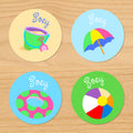 Summer beach personalized kids name round waterproof labels with pail, shovel, sand, float, umbrella and beachball on sand, green and blue ocean background