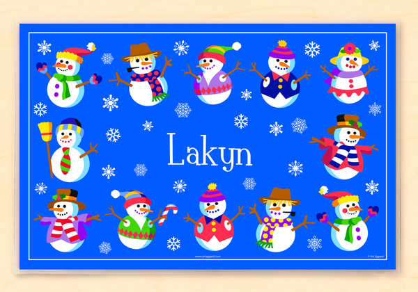Personalized Snowman placemat for kids. Front is deep blue with 12 snowmen each with colorful hats or scarves. Name is in the center in white with snowflakes.