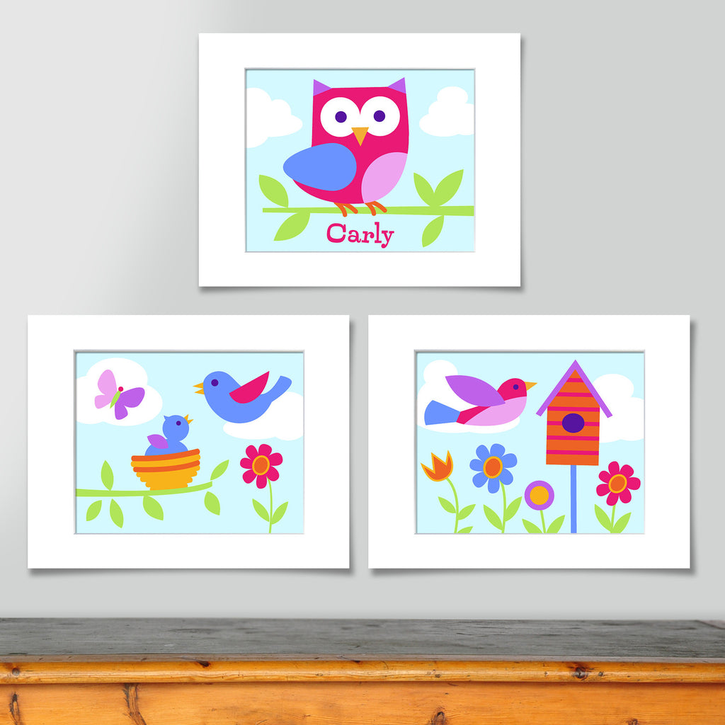 Set of 3 coordinating nature prints. Owl print with colorful owl in tree and personalized with childs name. Second print with baby bird in nest with mother, third print with bird house, bird in flight and colorful flowers.