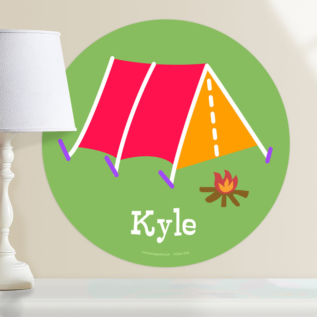 Kids personalized circular camping tent wall decal. Red and orange tent on a green background.