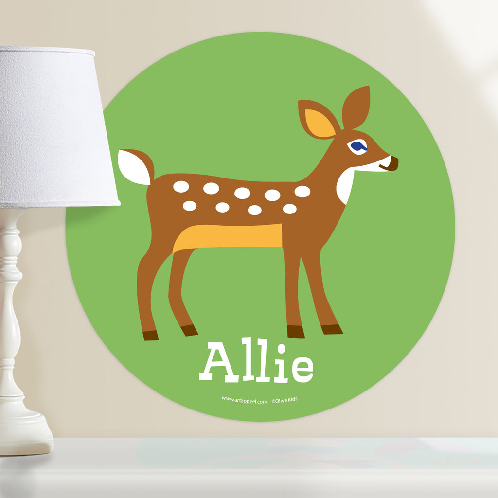 Personalized kids circular wall decal features brown deer with white spots and white tail on a green background.
