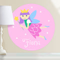 Kids fairy personalized circular wall decal.  Fairy with light purple hair on a pink packground.