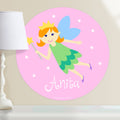 Kids fairy personalized circular wall decal.  Fairy with orange hair on a pink packground.