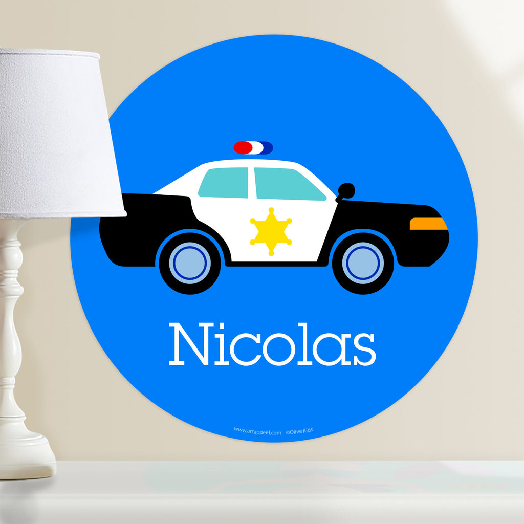 Personalized kids hero themed wall decal.  Black and white police car on a blue background.