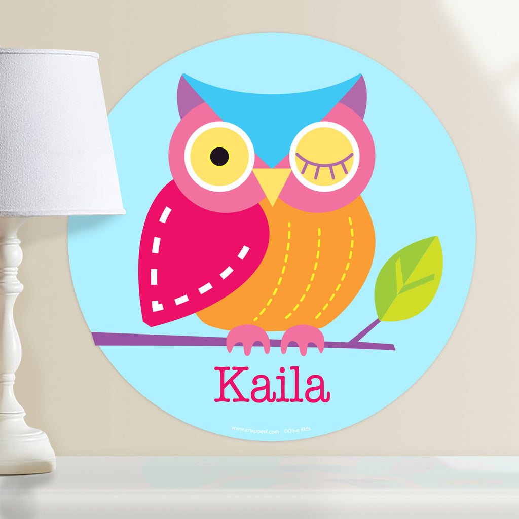 Owl personalized kids circular wall deca.l Colorful owl sitting on a branch on a light blue background.