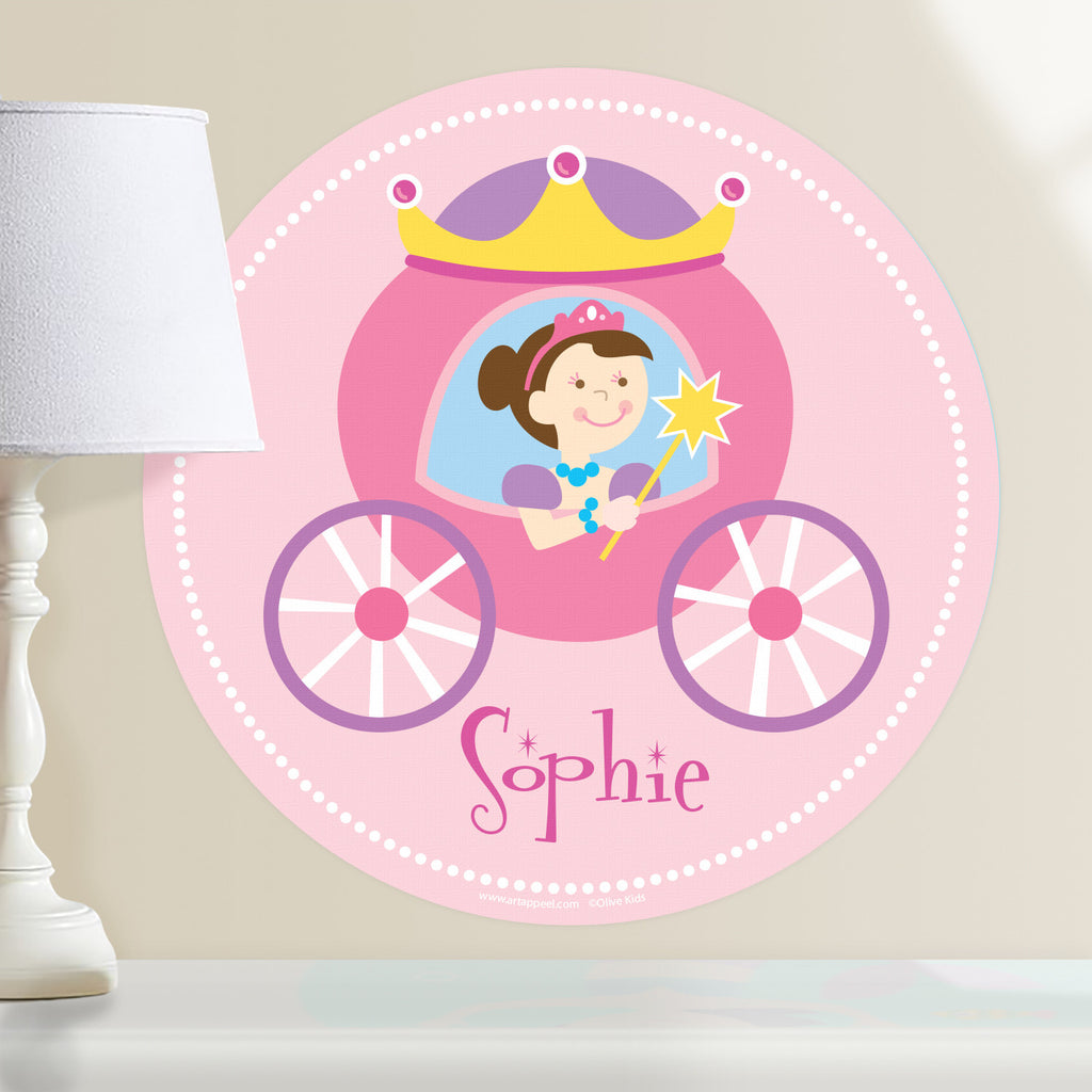 Princess personalized wall decal.  Circular shape, with dark hair princess sitting in her pink and purple coach. Light pink background.