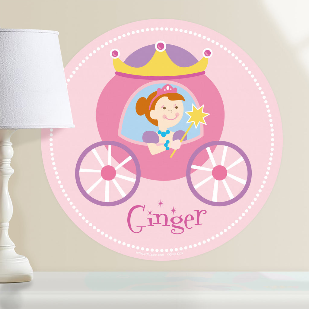 Princess personalized wall decal.  Circular shape, with red hair princess sitting in her pink and purple coach. Light pink background.