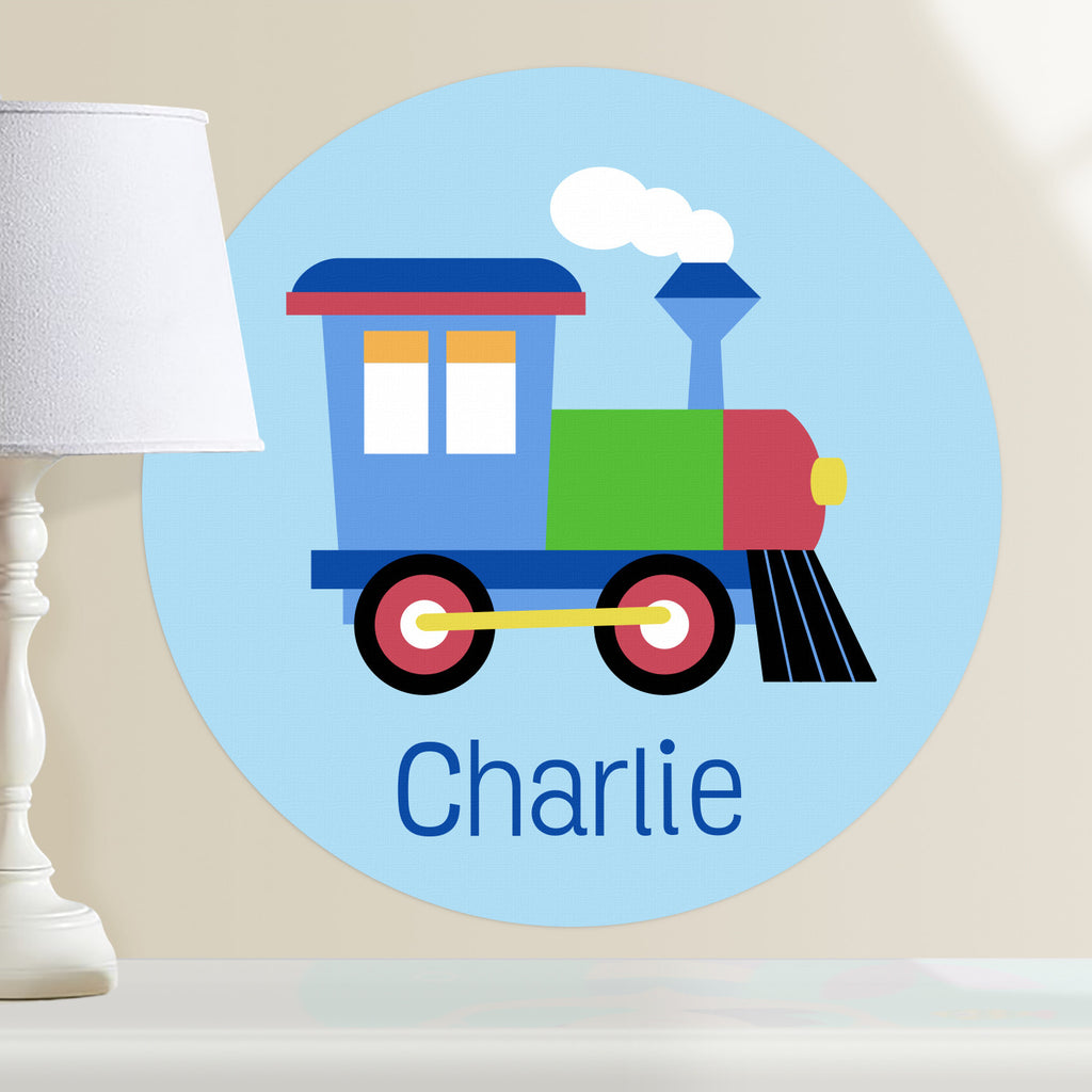 Kids personalized train decal features colorful train engine on a light blue background. Circular shaped decal.